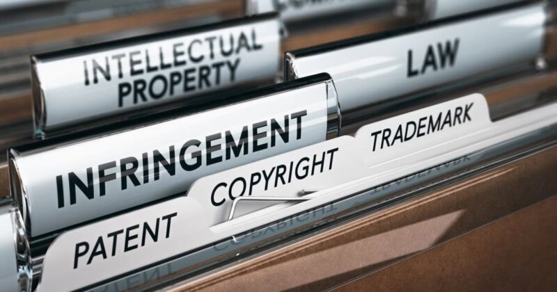stock image of legal folders with words Patent, Intellectual Property, Law