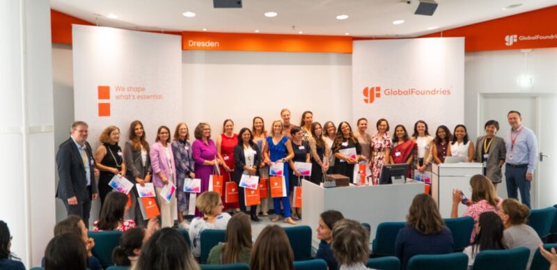 SWE Dresden group photo with All speakers on the stage receiving certificates and thank yous from GlobalFoundries management