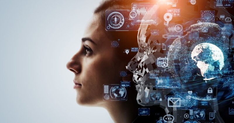 Stock photo of a woman engineer looking overwhelmed by AI